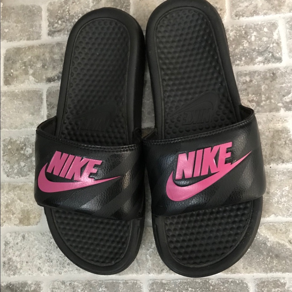 Black and pink nike slides